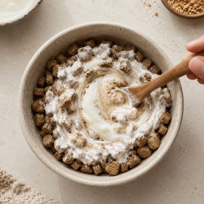 Ecogenya Mother's Milk Topper stirred with mushroom powder over kibble — packaged in Canada